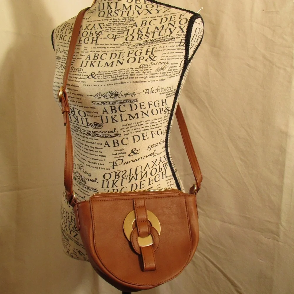 Time and Tru Cecile Crossbody Handbag in a brown or cognac color